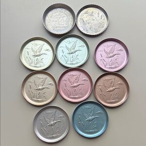 Set of 10 vintage MCM collectible coasters with flying geese. Aluminum